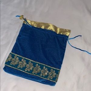 Blue pouch with gold embroidery & drawstring